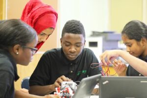 Urban Assembly students working on a robotics project