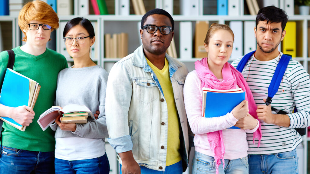 college students holding books