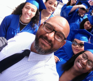 Alin Bennett With a Group of Students at Graduation