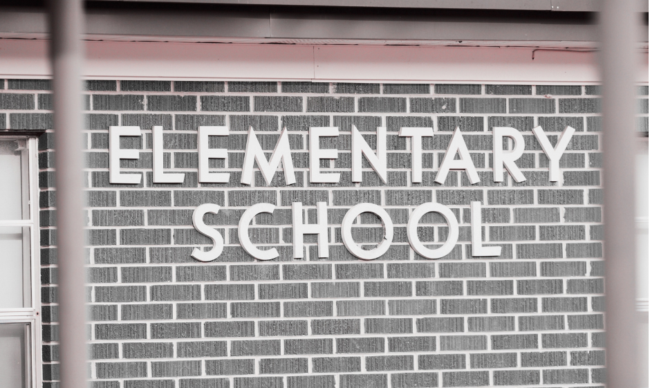 Side of a brick building with the words elementary school